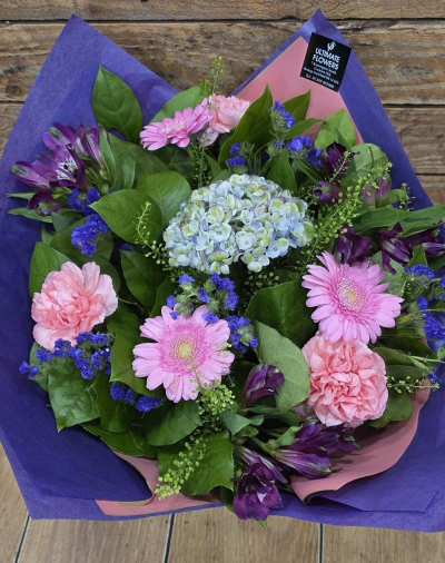 Violet Harmony - A beautiful bouquet of soft pinks, cool blues and rich purple tones, finished with fresh greenery for a colourful, elegant look.