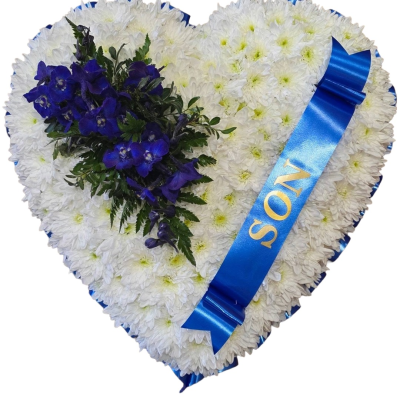Sapphire Heart Tribute - A classic heart-shaped tribute in crisp white and rich blue tones, finished with coordinating ribbon and a striking floral accent.